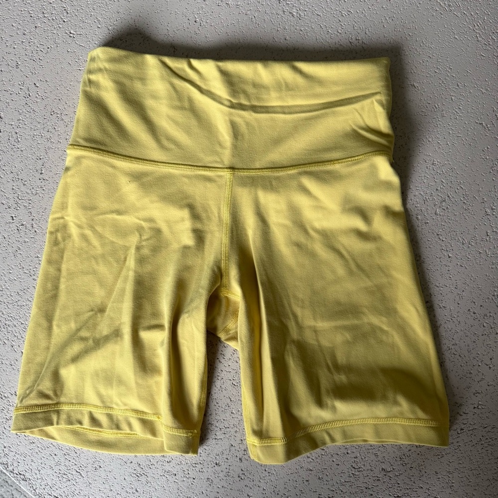 Aritzia TNA action bike shorts - yellow. (Lemonade) - 7”